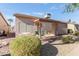 A view of the house featuring a covered patio and an air conditioning unit on the roof at 1871 E Westchester Dr, Chandler, AZ 85249