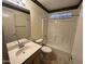 Compact bathroom with a neutral-toned vanity and a shower-tub combination at 1871 E Westchester Dr, Chandler, AZ 85249