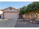 Charming single-Gathering home with a well-maintained front yard and a two-car garage, bathed in warm sunlight at 1871 E Westchester Dr, Chandler, AZ 85249