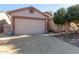 Charming single-Gathering home with a well-maintained front yard and a two-car garage, bathed in warm sunlight at 1871 E Westchester Dr, Chandler, AZ 85249