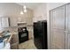 A functional kitchen featuring wooden cabinetry and modern appliances for comfortable cooking at 1871 E Westchester Dr, Chandler, AZ 85249