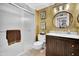 Bathroom featuring a vanity, marble countertop and walk-in shower at 18835 N Mayan Dr, Sun City, AZ 85373