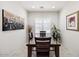 Dining room with large window and modern decor at 21232 N 262Nd Dr, Buckeye, AZ 85396