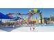 A large waterpark with a wave pool and tall colorful water slides at 24809 N 41 Ave, Glendale, AZ 85310