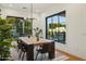 Bright dining room with large windows overlooking the pool at 3530 E Glenrosa Ave, Phoenix, AZ 85018