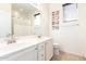 Bathroom with double sink vanity, tile flooring, and a large mirror at 3890 S Star Canyon Dr, Gilbert, AZ 85297