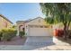 Charming single-story home featuring a two-car garage, desert landscaping, and a welcoming entryway at 3890 S Star Canyon Dr, Gilbert, AZ 85297