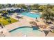 An aerial view displaying the community pool area, showing both the large pool and smaller splash pool at 3890 S Star Canyon Dr, Gilbert, AZ 85297