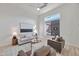 Neutral living room featuring modern furniture and natural light at 42038 N Moss Springs Rd, Anthem, AZ 85086