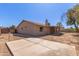 A sprawling backyard featuring desert landscaping, and a concrete slab at 6534 S Marilyn Ann Dr, Tempe, AZ 85283