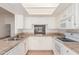 Well-lit kitchen featuring tile countertops and stainless steel sink at 6534 S Marilyn Ann Dr, Tempe, AZ 85283