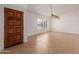 Inviting living room featuring neutral tile floors, and a large window at 6534 S Marilyn Ann Dr, Tempe, AZ 85283