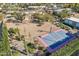 Aerial view of the backyard and basketball court of the estate at 6915 E Gary Rd, Scottsdale, AZ 85254