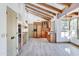 Well-equipped kitchen featuring custom cabinetry, modern appliances, and exposed beam ceilings at 6915 E Gary Rd, Scottsdale, AZ 85254