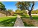 Walking path through a beautiful green space at 7209 E Mcdonald Dr # 51, Scottsdale, AZ 85250