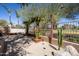 Unique outdoor pergola structure with climbing vines and ambient lighting, creating a tranquil seating area at 8233 E Foothill Cir, Scottsdale, AZ 85255