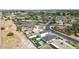 Aerial view of the property showing the backyard pool, patio, and surrounding neighborhood at 92 N Palm St, Gilbert, AZ 85234