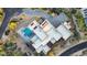 An aerial view capturing the architectural details of this desert home with a pool, blending luxury and modern design at 10354 E Celestial Dr, Scottsdale, AZ 85262