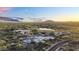 The property boasts incredible views and desert landscape, complete with pool and spa perfect for outdoor enjoyment at 10354 E Celestial Dr, Scottsdale, AZ 85262