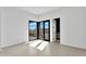 Bright bedroom with access to outdoor space and adjacent modern bathroom at 10354 E Celestial Dr, Scottsdale, AZ 85262