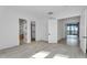 Bright bedroom with en-suite bathroom and large glass doors to patio, modern and light at 10354 E Celestial Dr, Scottsdale, AZ 85262