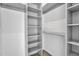 Spacious, well-organized walk-in closet with ample shelving and neutral tones at 10354 E Celestial Dr, Scottsdale, AZ 85262