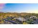 Contemporary desert home, neutral colors, mountain views and desert landscaping at 10354 E Celestial Dr, Scottsdale, AZ 85262