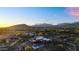 Modern desert home features a private pool and backyard retreat with desert and mountain views at 10354 E Celestial Dr, Scottsdale, AZ 85262