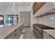 Gourmet kitchen boasts a gas range with double oven and a marble backsplash at 10354 E Celestial Dr, Scottsdale, AZ 85262