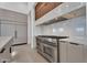 Gourmet kitchen has a gas range and double oven for cooking at 10354 E Celestial Dr, Scottsdale, AZ 85262