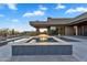 Luxury home featuring a pool, integrated spa, and stylish pavers at 10354 E Celestial Dr, Scottsdale, AZ 85262