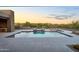 Inviting pool with water feature, desert views and ample patio space at 10354 E Celestial Dr, Scottsdale, AZ 85262