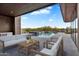 Inviting outdoor space with a sparkling pool, cozy seating, and a beautiful view at 10354 E Celestial Dr, Scottsdale, AZ 85262