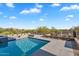 Poolside view overlooking the desert landscape with an inground spa at 10354 E Celestial Dr, Scottsdale, AZ 85262