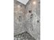 Elegant marble shower with modern fixtures and convenient built-in niche at 10354 E Celestial Dr, Scottsdale, AZ 85262