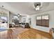 Inviting living room with wood-look floors, and a comfortable gray sofa at 10778 W Via Del Sol --, Peoria, AZ 85373