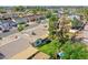 Aerial view of a charming neighborhood with well-maintained homes, lush landscaping, and mature trees at 108 W Ivyglen St, Mesa, AZ 85201