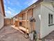 Exterior view of the side of the house with built in shelving at 108 W Ivyglen St, Mesa, AZ 85201