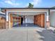Spacious two-car garage with ample storage space and a large concrete driveway at 108 W Ivyglen St, Mesa, AZ 85201