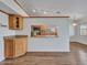 Kitchen view highlighting granite counters, stainless appliances, and a decorative backsplash at 108 W Ivyglen St, Mesa, AZ 85201