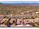Stunning community aerial view featuring luxurious homes, a tennis court and picturesque mountain views at 11267 E Beck Ln, Scottsdale, AZ 85255