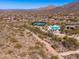 Aerial view featuring a community pool, tennis courts and walking paths at 11267 E Beck Ln, Scottsdale, AZ 85255