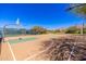 Outdoor basketball court with pristine court markings and mountain views at 11267 E Beck Ln, Scottsdale, AZ 85255