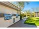 Convenient outdoor grill area with built-in stainless steel grills, ideal for social gatherings and summer barbecues at 11267 E Beck Ln, Scottsdale, AZ 85255