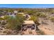 An aerial view of a picnic area with a covered table nestled within the natural desert landscape at 11267 E Beck Ln, Scottsdale, AZ 85255