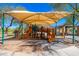 Fun-filled community playground with colorful equipment and shaded areas, providing a safe and engaging space for children at 11267 E Beck Ln, Scottsdale, AZ 85255