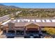 Exterior view of Thompson 105, a retail center offering diverse business with plentiful parking spots at 11267 E Beck Ln, Scottsdale, AZ 85255
