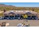 Shopping center featuring various businesses, including Allstate, Yoga, and Cafe Au Plait with ample parking at 11267 E Beck Ln, Scottsdale, AZ 85255