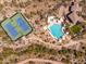 Aerial view of meticulously maintained community tennis courts, offering a recreational space for residents at 11267 E Beck Ln, Scottsdale, AZ 85255
