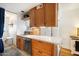 Updated kitchen features quartz countertops, custom cabinets, and stainless steel dishwasher at 1173 E Beryl Ave, Phoenix, AZ 85020
